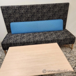 Black Patterned Keilhauer Sofa with Blue Accent Pillow